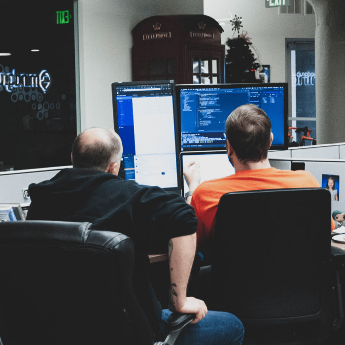 Team reviewing code